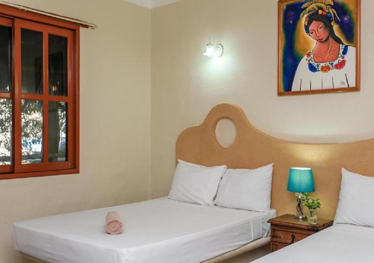 Esduma Iguanas Hotel Playa Del Carmen Buitenkant foto